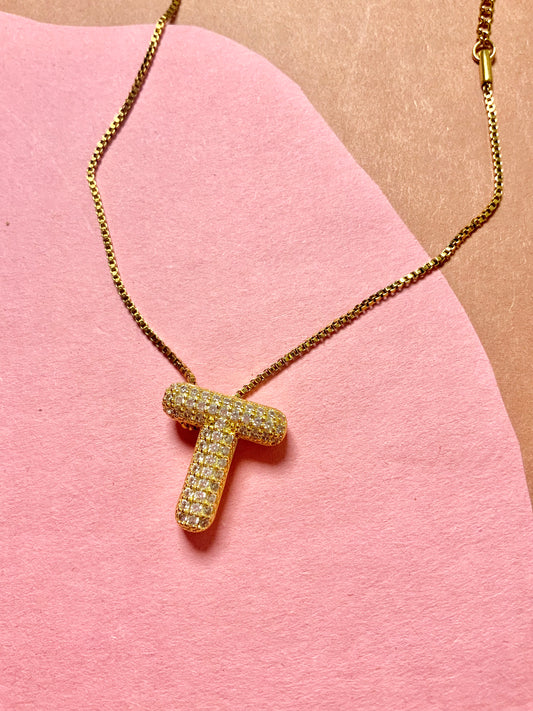 The “IT” initial